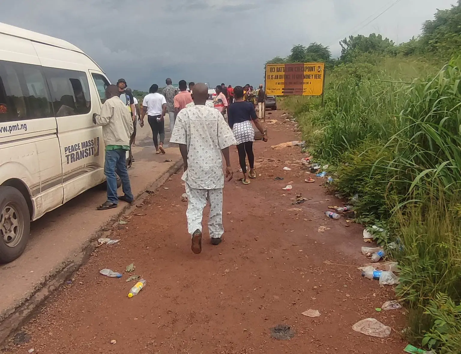 Commuters come down and trek past military checkpoints 1 1536x1180 1