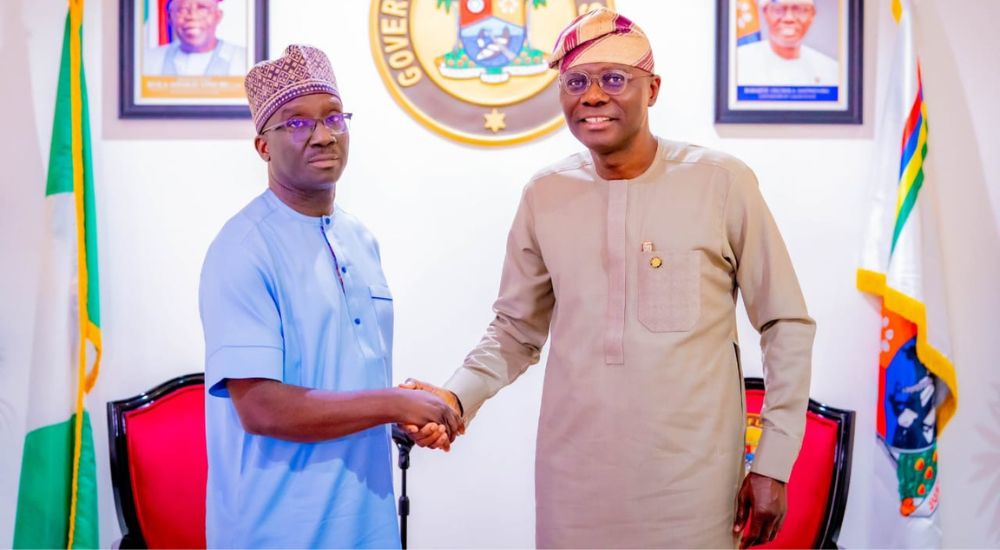 Edo State Governor Elect Monday Okpebholo in a handshake with Governor of Lagos State Babajide Sanwo