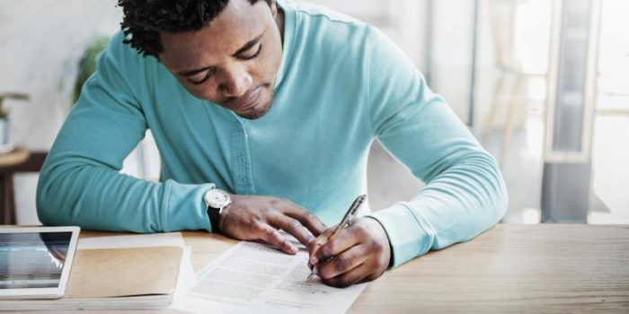 black man planning stock exchange writing concept 1