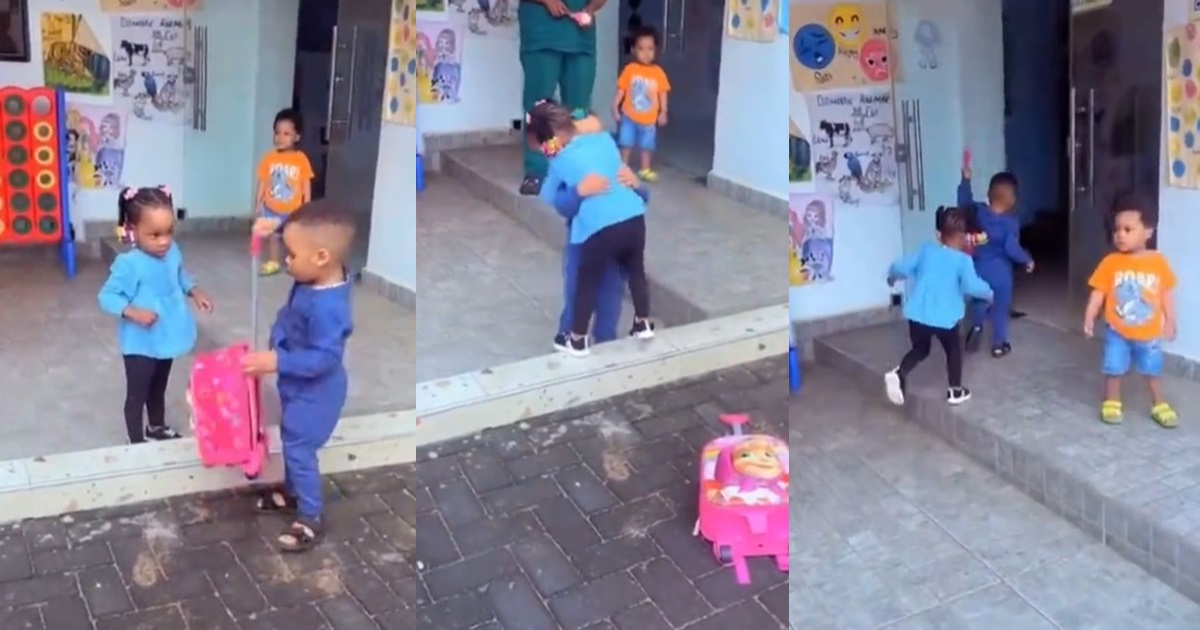 “This boy is more Loving and Caring than some matured men” – Little boy warms hearts as he embraces and assists his classmate with her bag on their first day of school (WATCH)