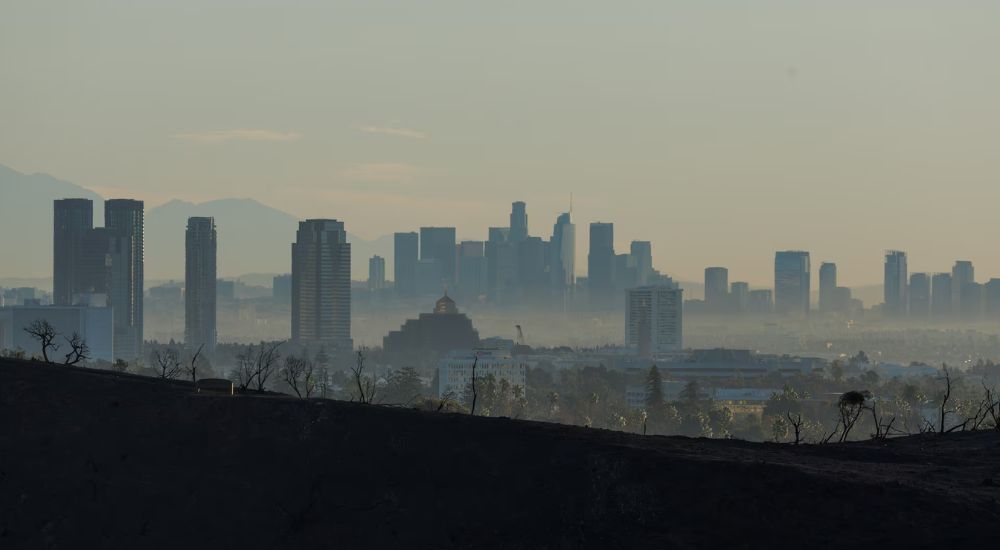 Los Angeles skyline is seen following the Palisades Fire at the Pacific Palisades neighborhood in Lo