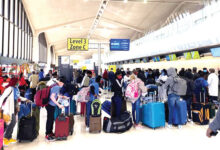 Nigerian returnees from the United State of America during their arrival at the Nnmadi Azikiwe Inter