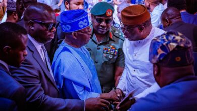 Fayemi shaking hands with President Bola Tinubu at Babangidas book launch 1200x630