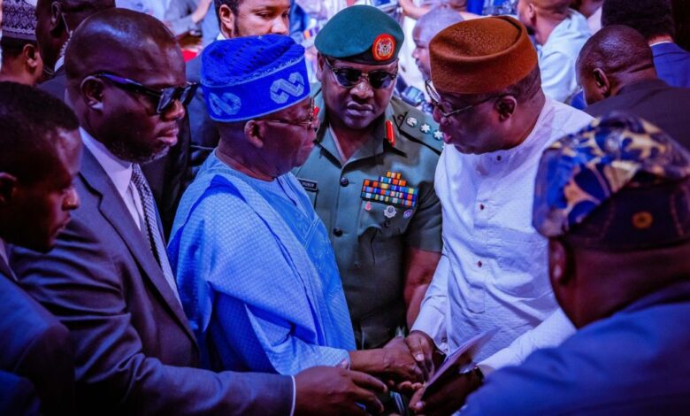 Fayemi shaking hands with President Bola Tinubu at Babangidas book launch 1200x630