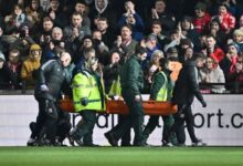 Taiwo Awoniyi stretchered off the field after the collision