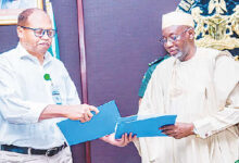 Jigawa Gov Namadi and Chief of the UNICEF Kano Field Office Mr. Mohammed Farah after signing the agr