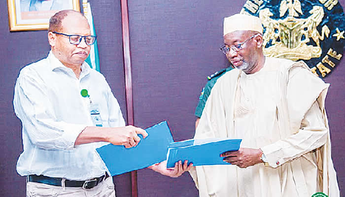 Jigawa Gov Namadi and Chief of the UNICEF Kano Field Office Mr. Mohammed Farah after signing the agr